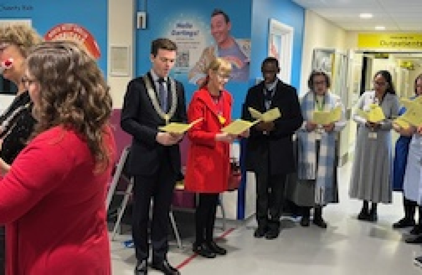 Carol singing with staff and patients