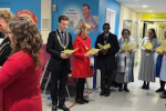 Carol singing with staff and patients